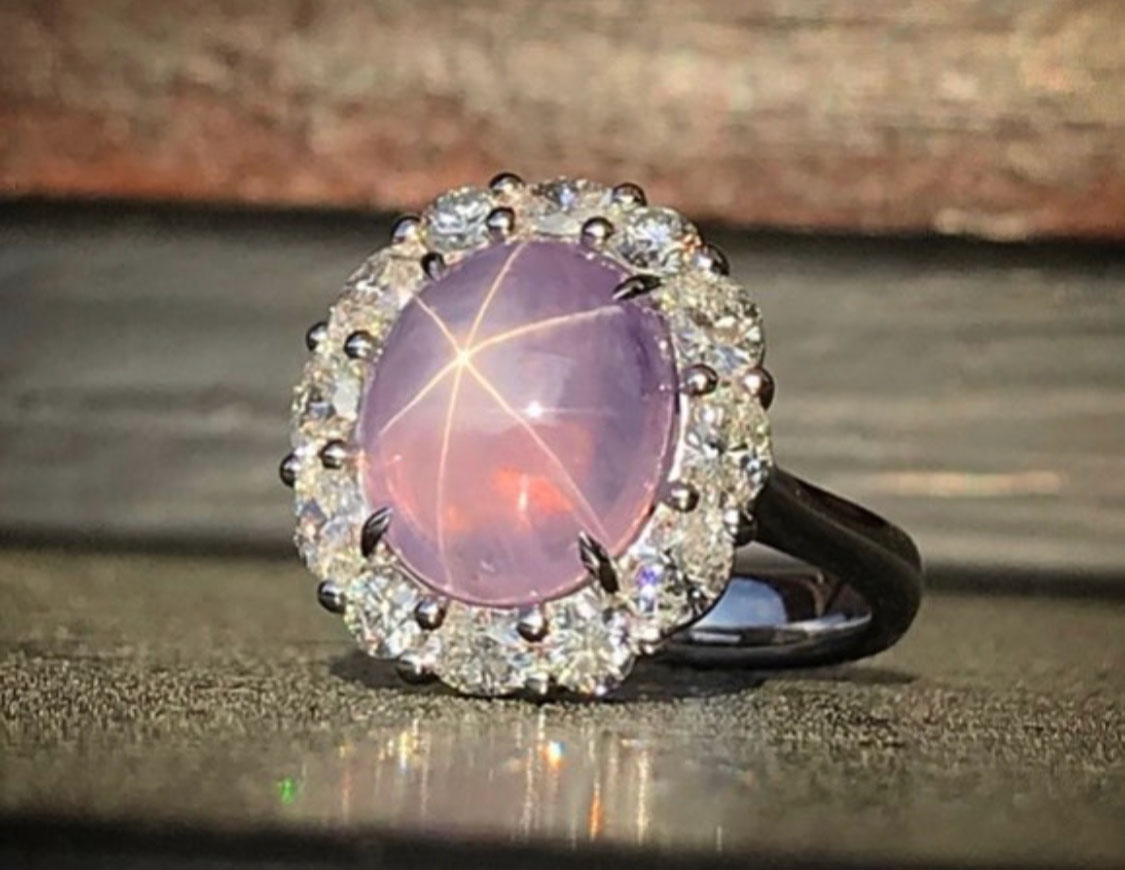 Sapphire & diamond ring with a pink intense star sapphire