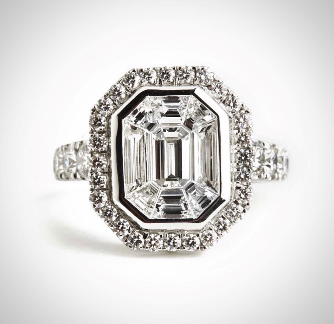 Diamond ring with illusion set diamonds