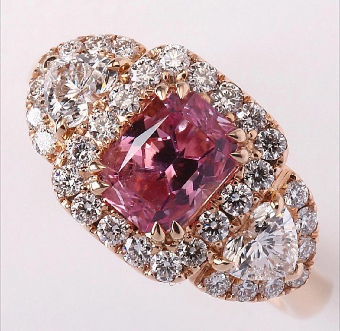 Pink sapphire & diamond ring.